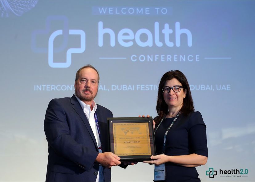  Dr. Nehmat El Banna receiving Healthcare Leadership Award at Global Healthcare Conference